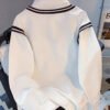 3cc71efc910a42f5abe0f09c744c538e-goods.jpeg American Retro College Style Color-Block Fake Two-Piece Polo Collar Long Sleeve Top for Women