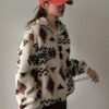 ac1660a0-8bab-4510-b305-381f78f6e0c0.jpg Women's Plush Sweatshirt with Zipper Neck Detail