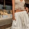e63b8de2-f9e8-4702-affc-56ae5cd0fc8e.jpg Boho Crochet Fringe Halter Crop Top