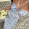 e7fb1532-2e5b-4266-b9b5-9e1473821dde.jpg Floral Backless Halter Waist-Cinching Dress